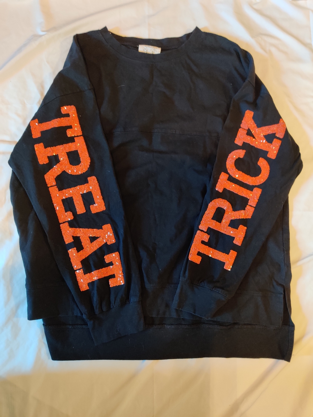 Fantastic Fawn Black Sweatshirt with Orange 'TREAT' and 'TRICK' Sleeve Graphics